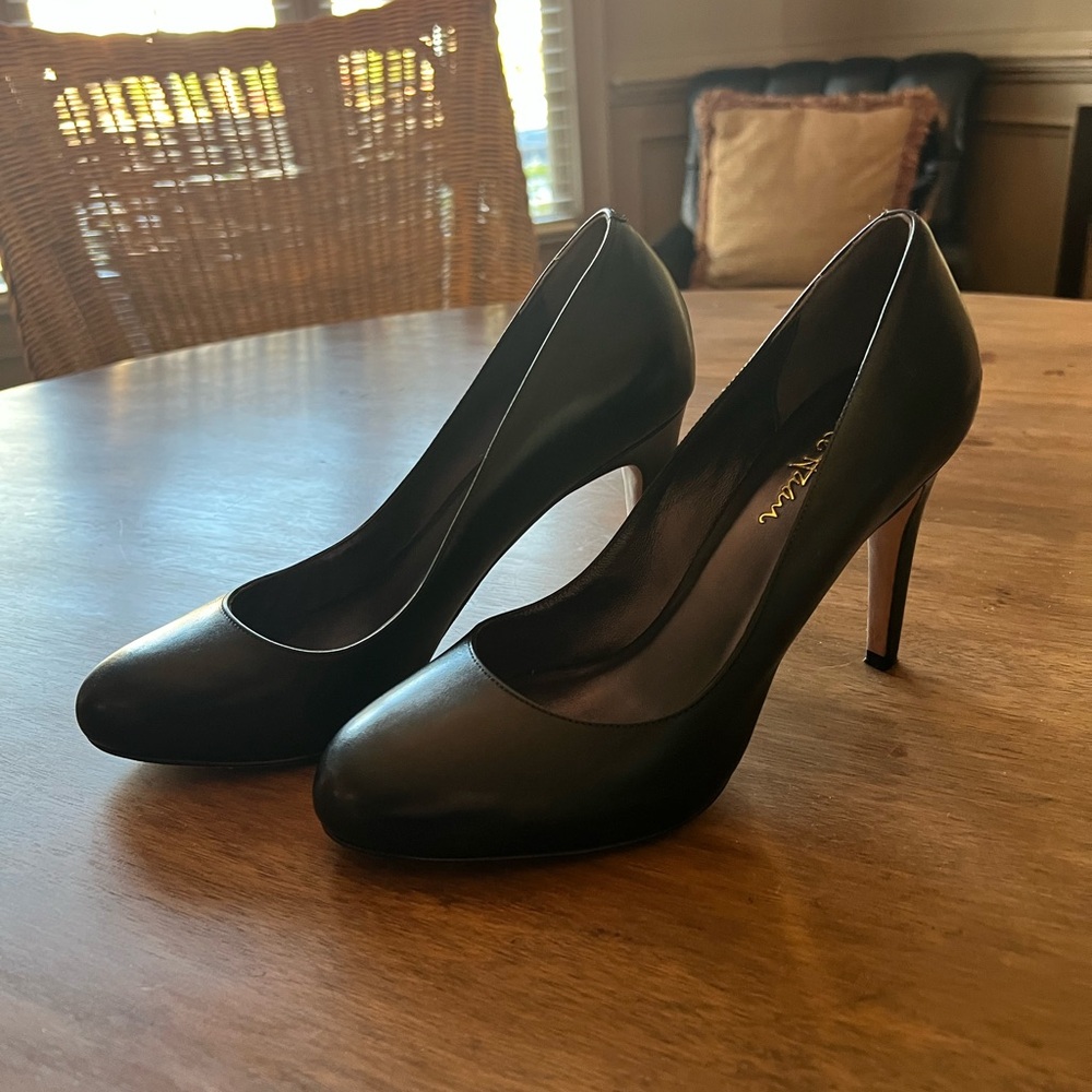 Cole Haan black pumps